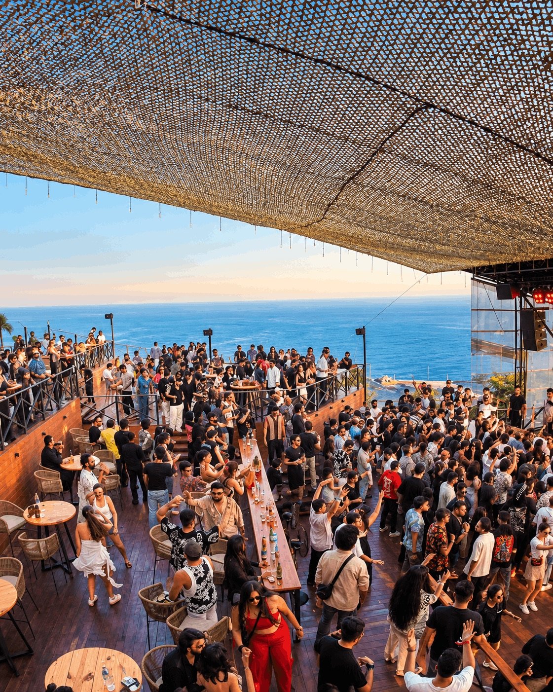 Open-air music gathering overlooking the sea