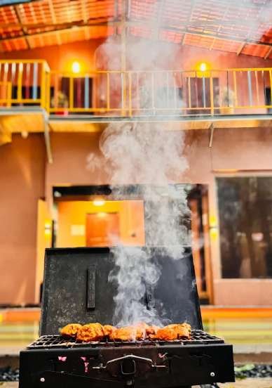 Food cooking at a Lost Paradise barbecue evening