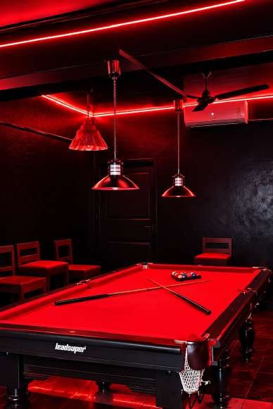 Red-lit 8-ball room