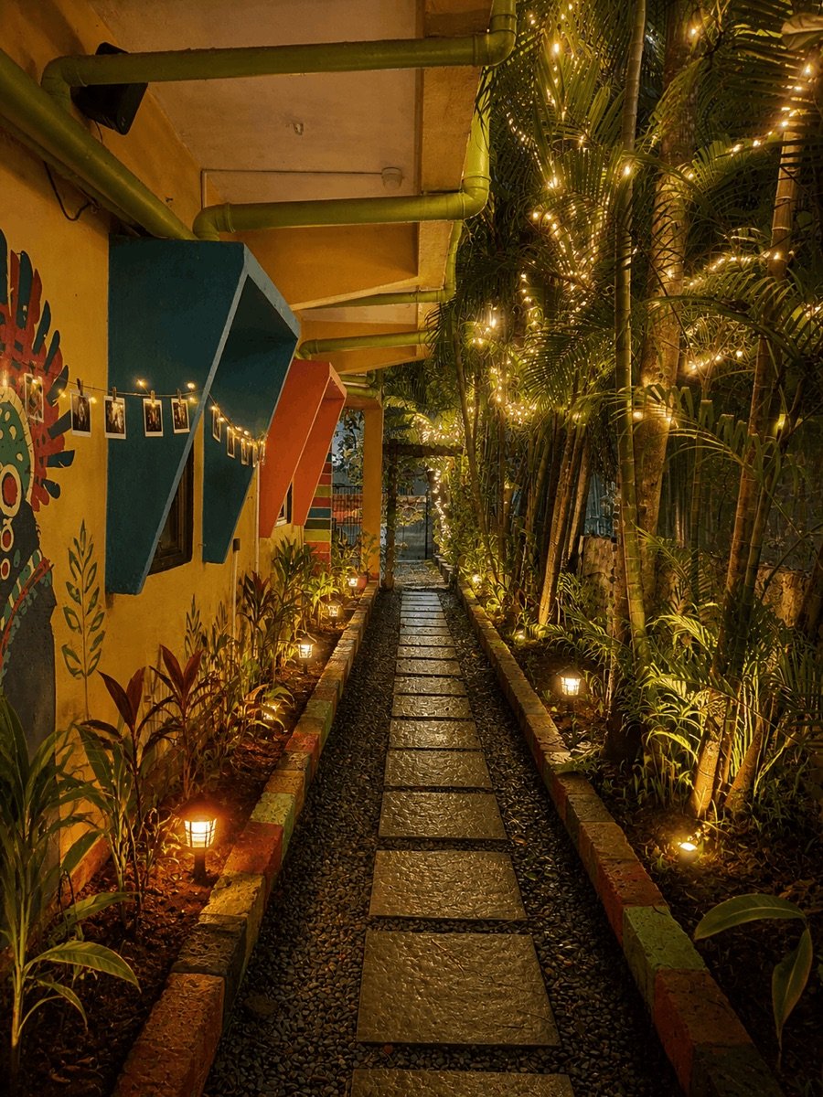 Illuminated tropical pathway at Lost Paradise